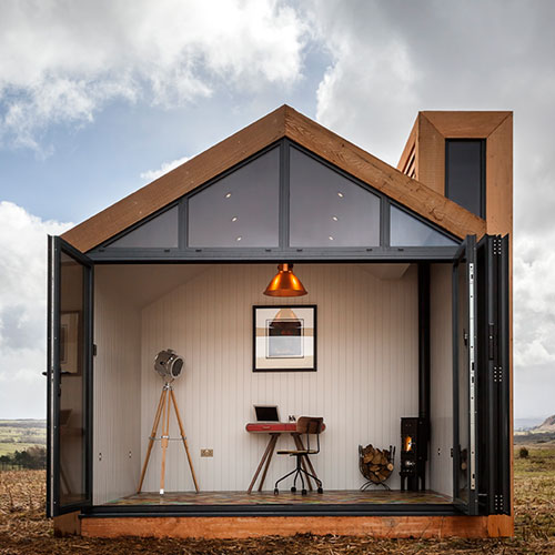 my bothy bi-fold doors open with office and desk